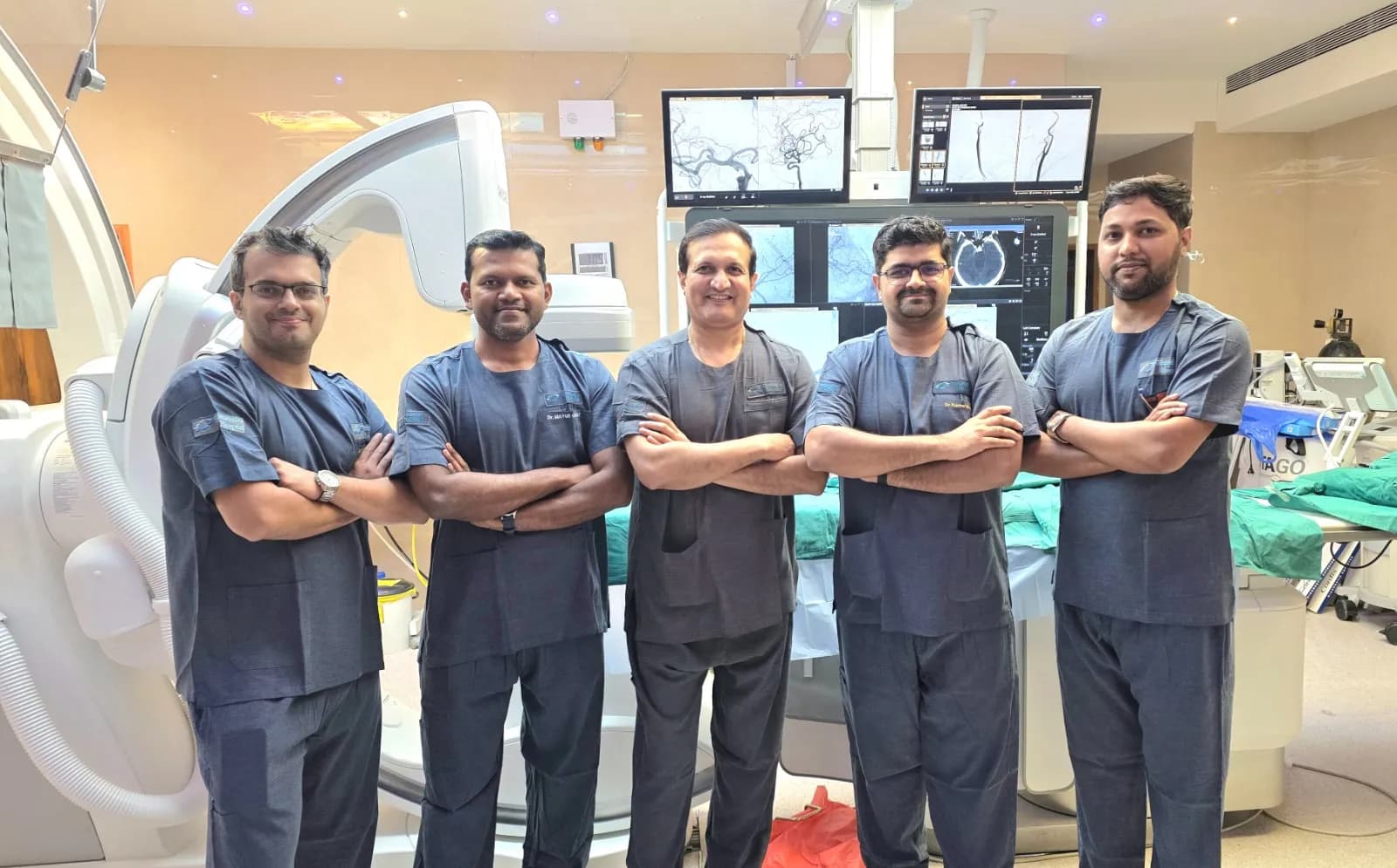 Dr. Nitin Dange with the MKN Cerebros neurovascular team in the biplane cathlab